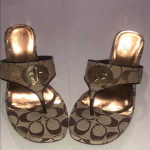 Coach sandals.